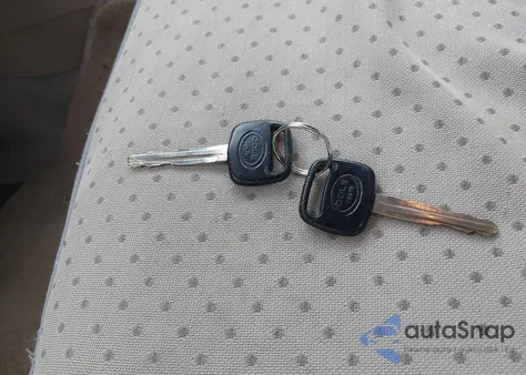 1999 Toyota Corolla Ve z USA, uszkodzony, nr VIN 1NXBR12E2XZ257771